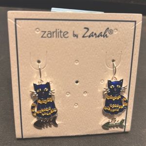 Blue and yellow dangling cat earrings
